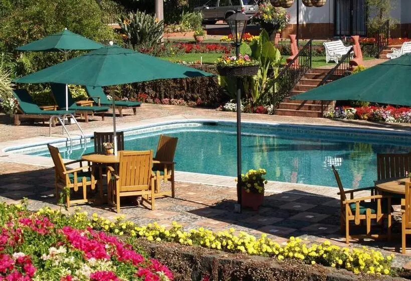 Отель Mansion Del Cupatitzio