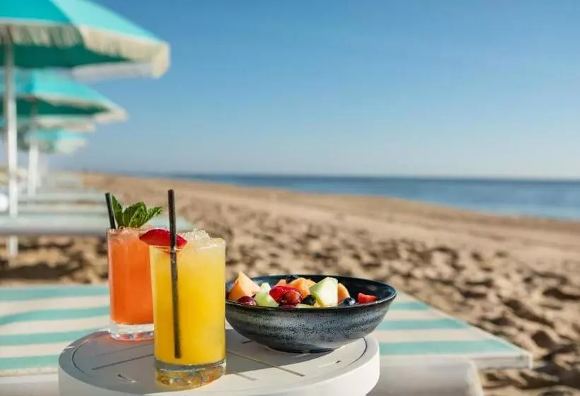 酒店 Ashore Resort & Beach Club