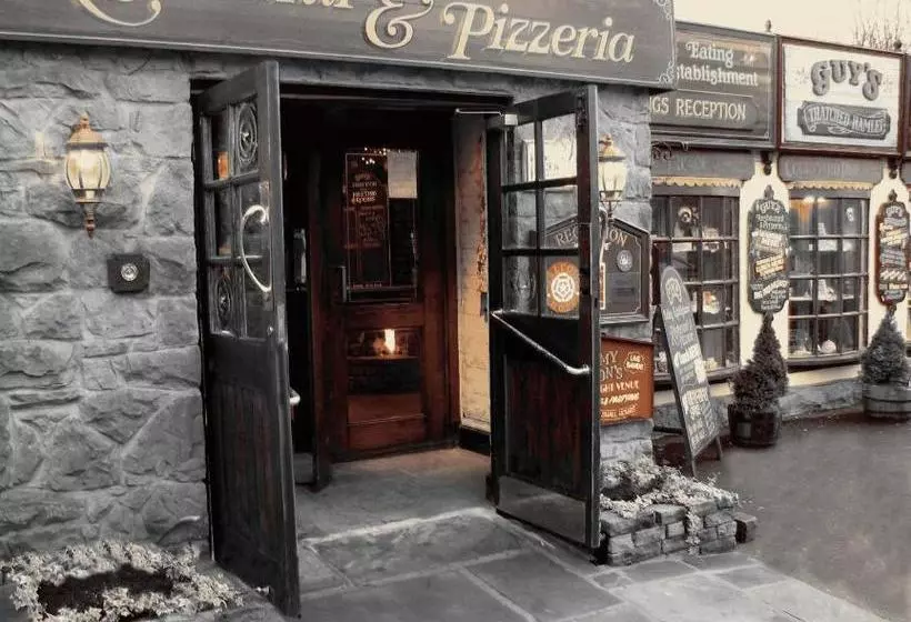 בית מלון כפרי Guy's Thatched Hamlet