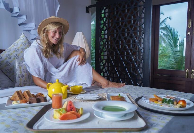 Отель Calamansi Cove Villas