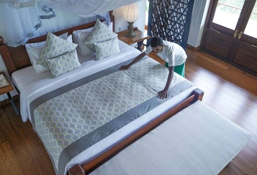 Отель Calamansi Cove Villas