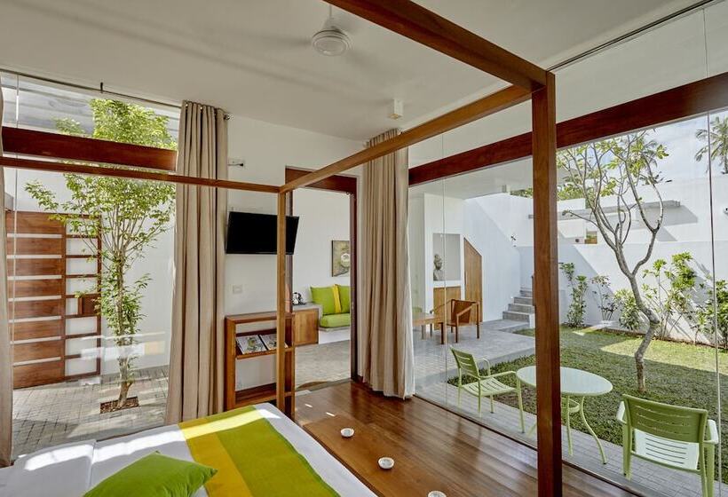 Отель Calamansi Cove Villas