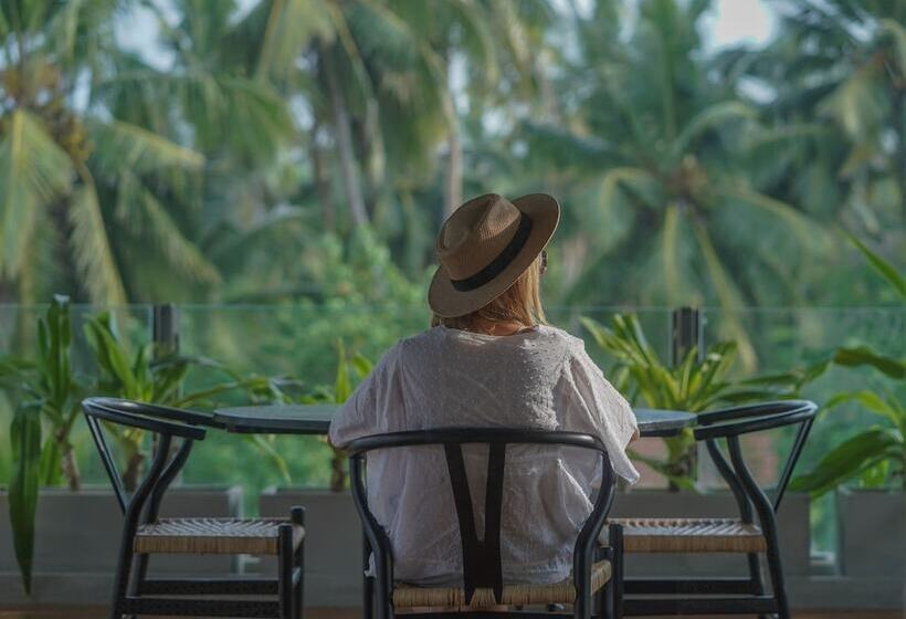 Отель Calamansi Cove Villas