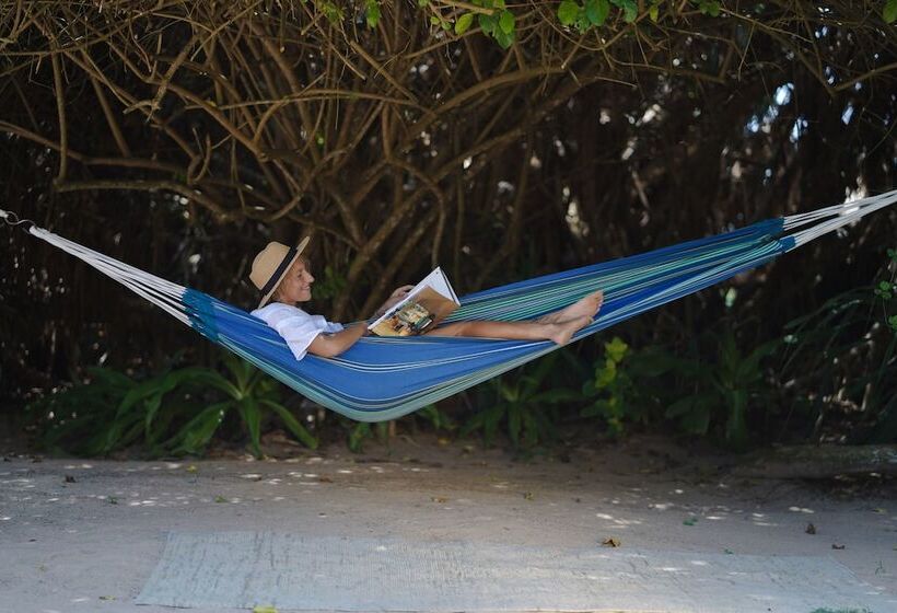 Отель Calamansi Cove Villas