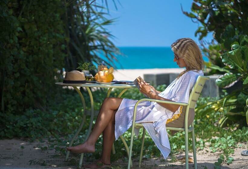 Отель Calamansi Cove Villas