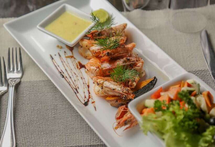 Отель Calamansi Cove Villas