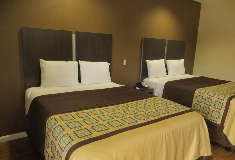 Отель Scottish Inn & Suites