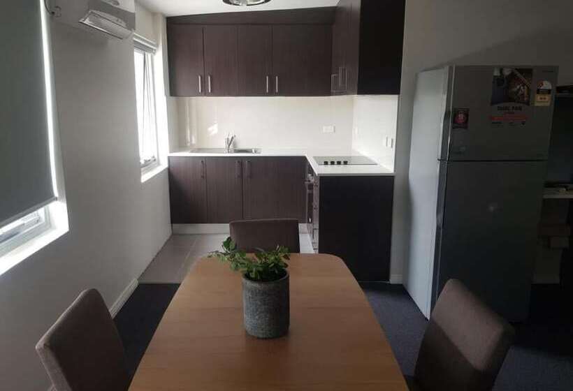 모텔 Carlton Suites