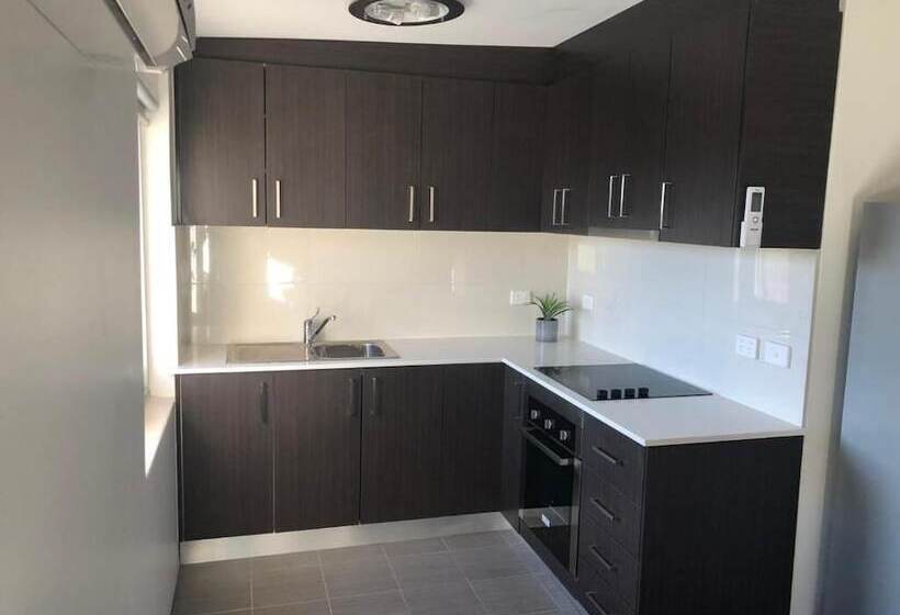 모텔 Carlton Suites