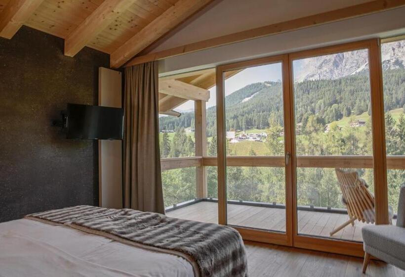 Отель Dolomiti Lodge Alverà