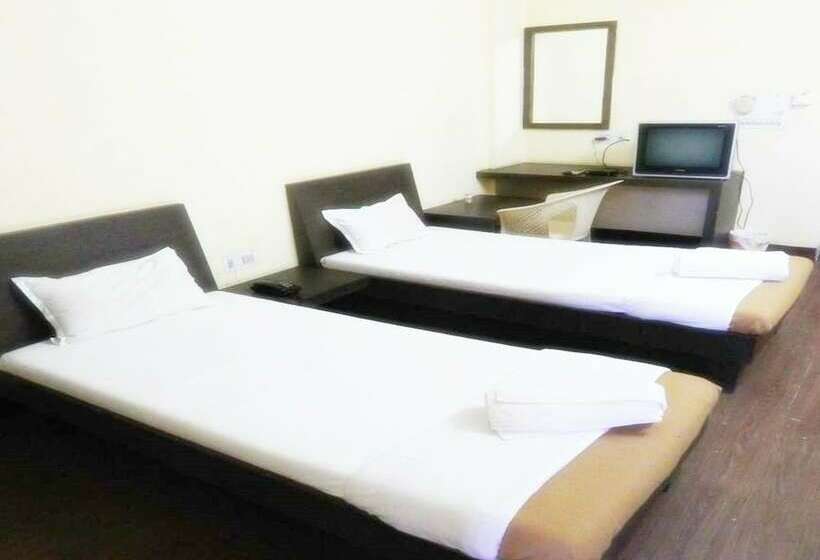 Отель Ashapura International By Zingo