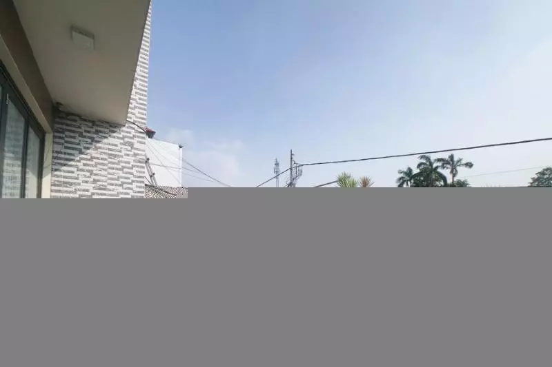 ペンション Reddoorz Plus Near Green Pramuka Square Mall