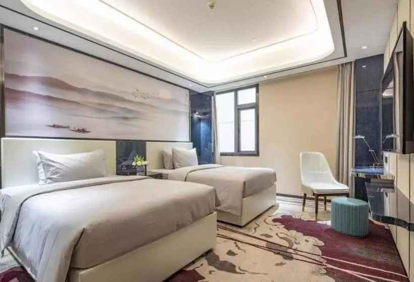 Hotelli Ramada By Wyndham Mengzi Suites