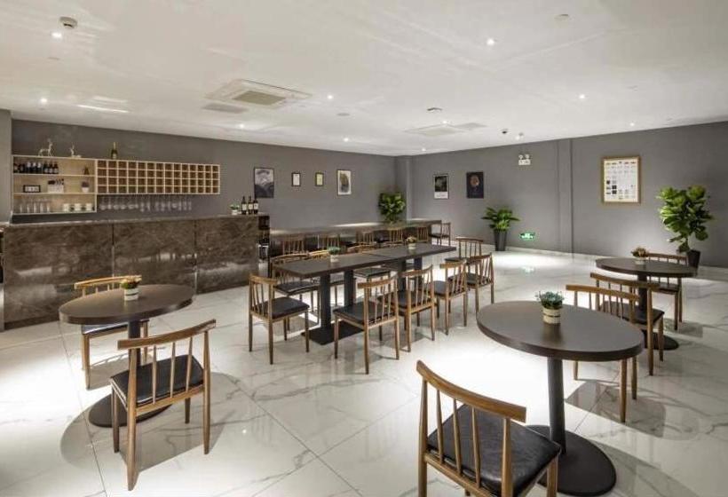 호텔 Ramada By Wyndham Mengzi Suites