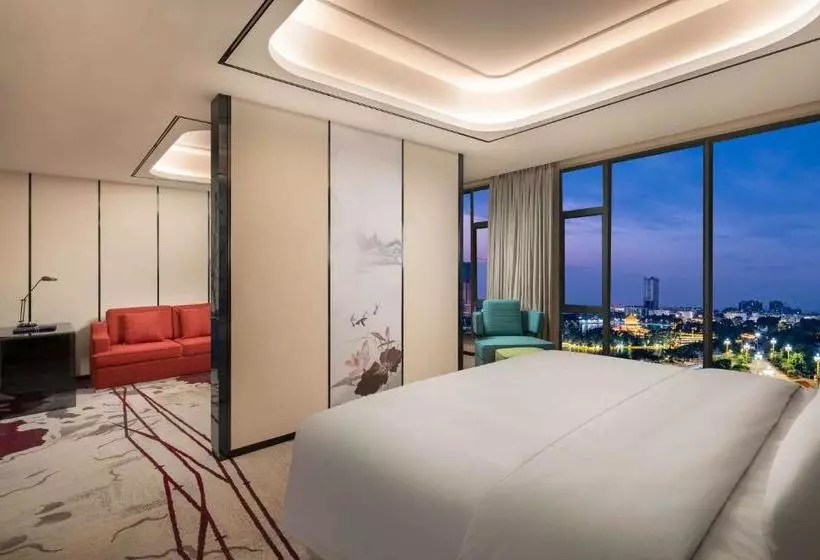 Hotelli Ramada By Wyndham Mengzi Suites