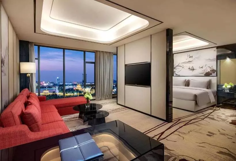 Hotelli Ramada By Wyndham Mengzi Suites