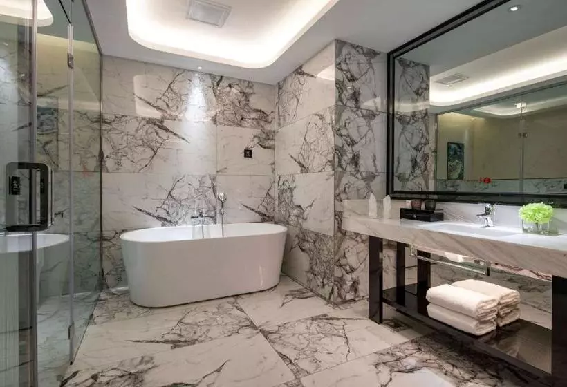 Hotelli Ramada By Wyndham Mengzi Suites