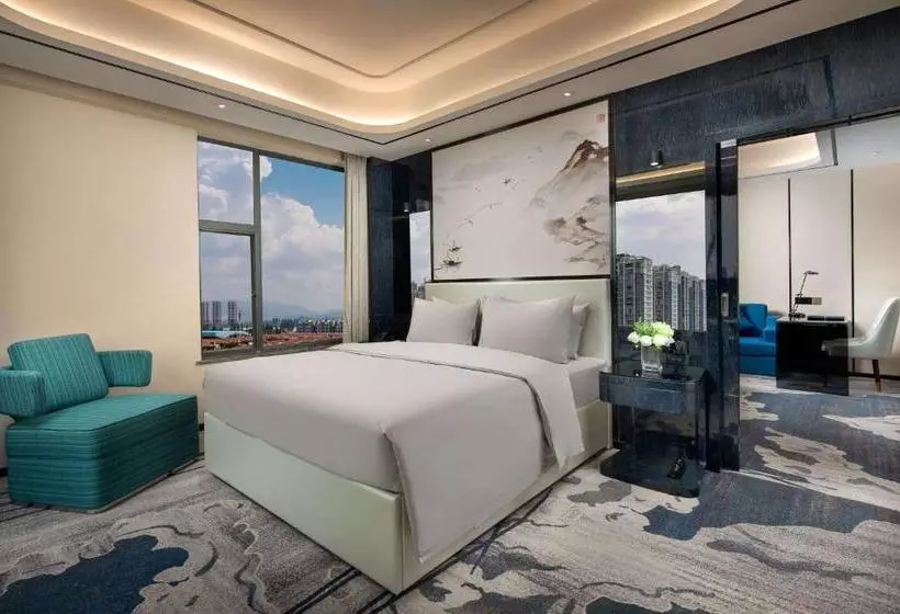 Hotelli Ramada By Wyndham Mengzi Suites