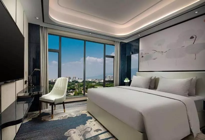 Hotelli Ramada By Wyndham Mengzi Suites