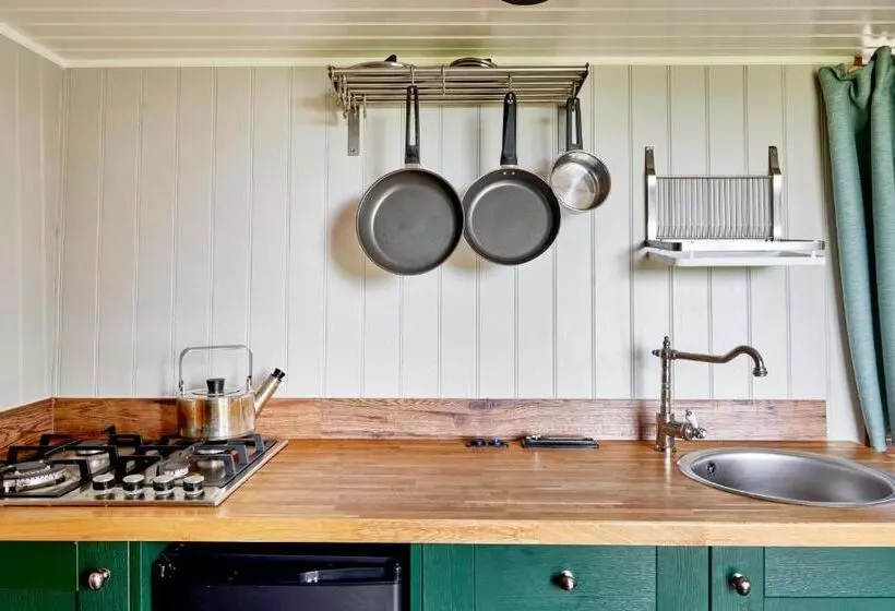 Extraordinary Huts Ltd