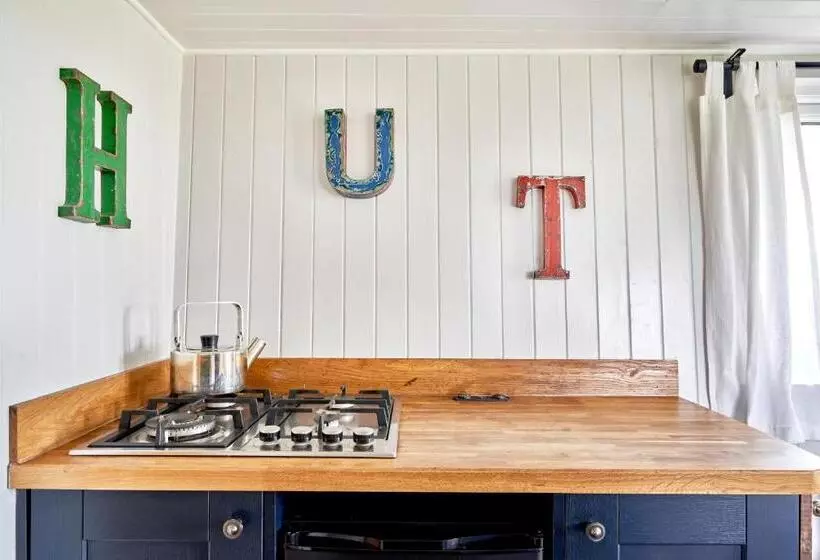 Extraordinary Huts Ltd