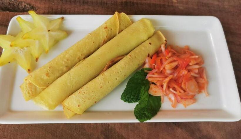 בית מלון כפרי Turtle Bay Beach Resort