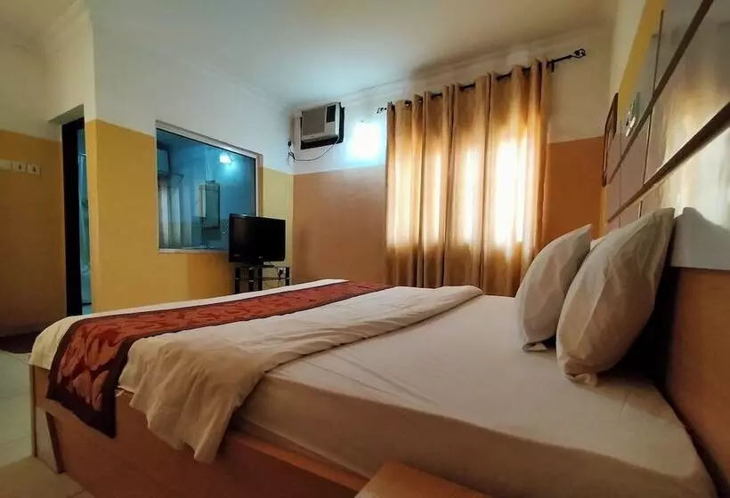 Joy House Hotel And Suites
