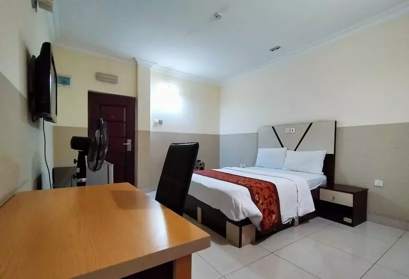 Joy House Hotel And Suites
