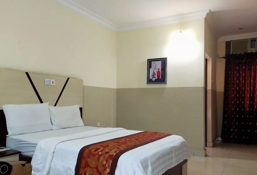 Joy House Hotel And Suites