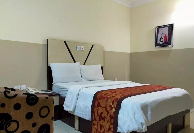 Joy House Hotel And Suites