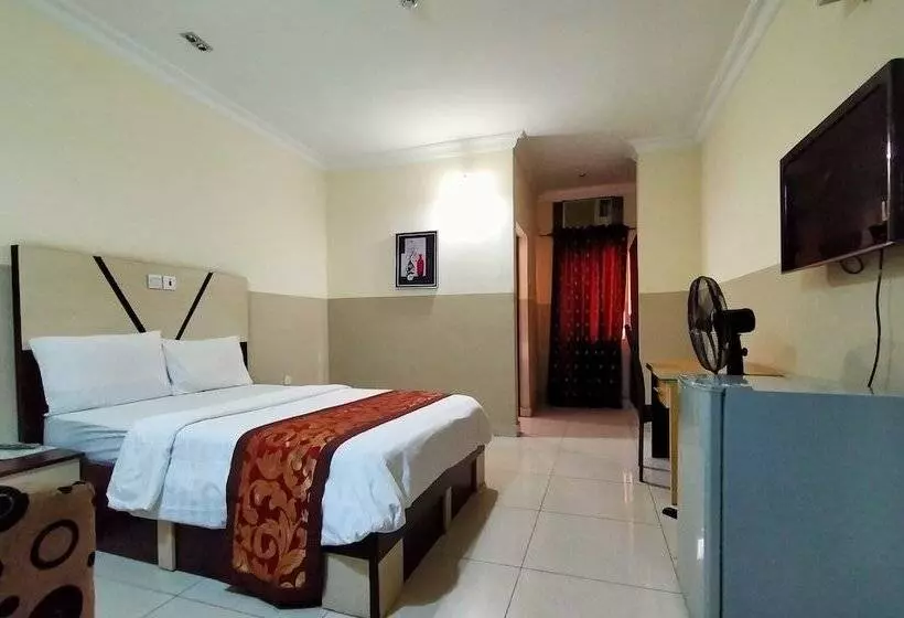 Joy House Hotel And Suites