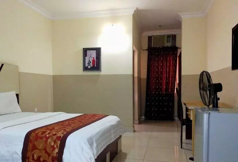 Joy House Hotel And Suites