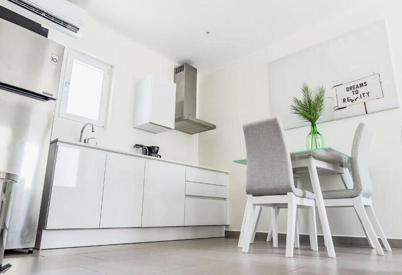 The Palm Leaf Apartments