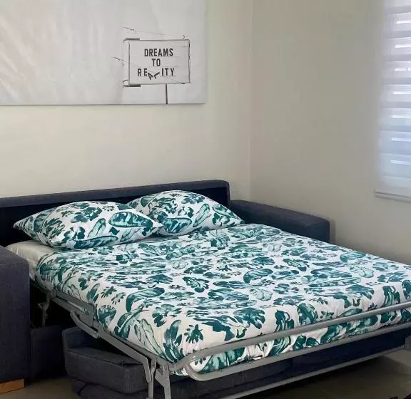 The Palm Leaf Apartments