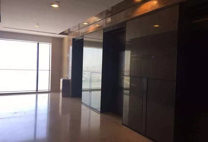 هتل Checkinn Business Apartment Poly World