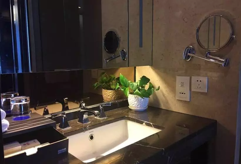 هتل Checkinn Business Apartment Poly World