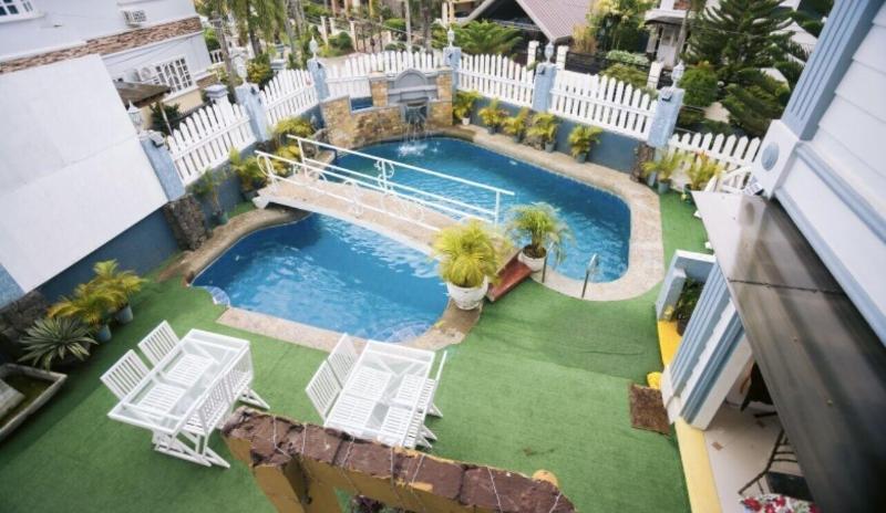 בית מלון כפרי Reddoorz Premium At The Grand Peninsula Suites