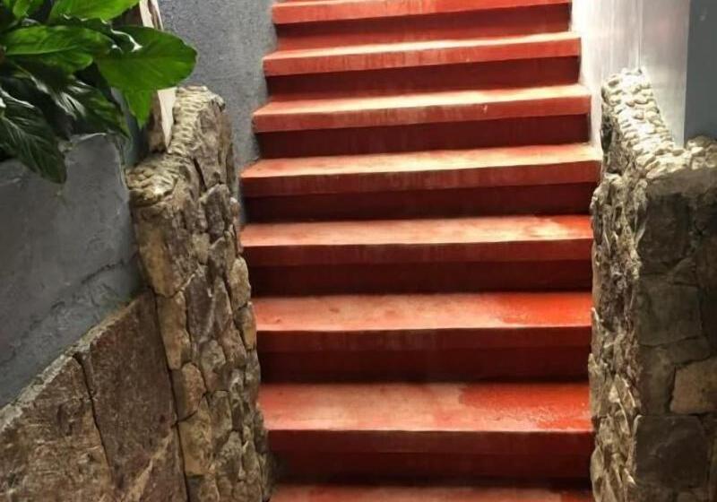 בית מלון כפרי Reddoorz Premium At The Grand Peninsula Suites