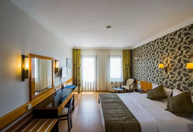 Отель Assos Eden Gardens