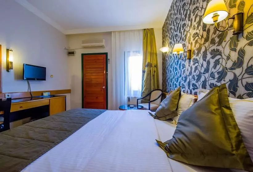 Отель Assos Eden Gardens