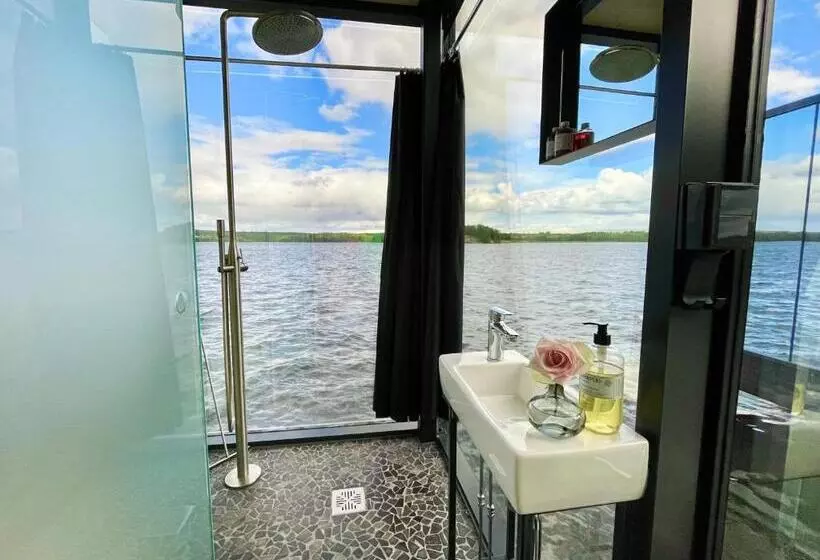 Lake Hotel Lehmonkärki   Haasi Mirror Houses