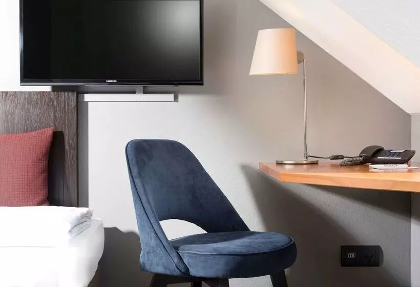 Отель Ramada By Wyndham München Airport