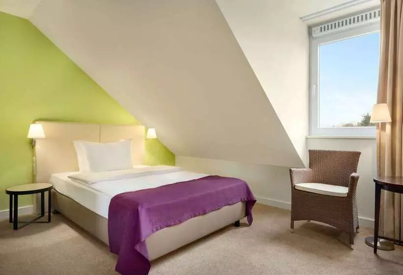 Отель Ramada By Wyndham München Airport