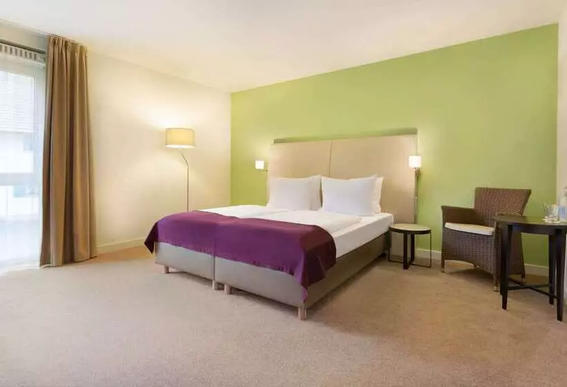 Отель Ramada By Wyndham München Airport