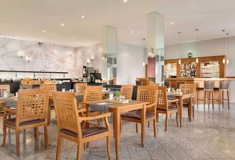 Отель Ramada By Wyndham München Airport