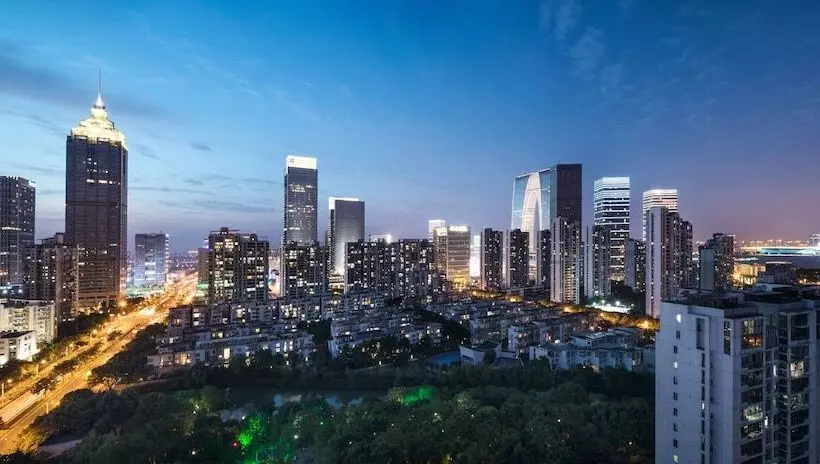 Отель Citadines Xinghai Suzhou