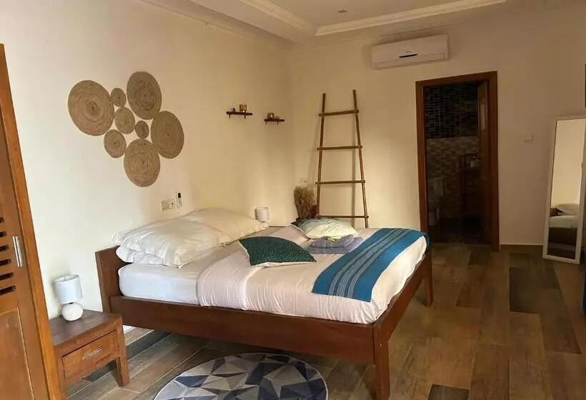 تختخواب و صبحانه L'oasis Guesthouse