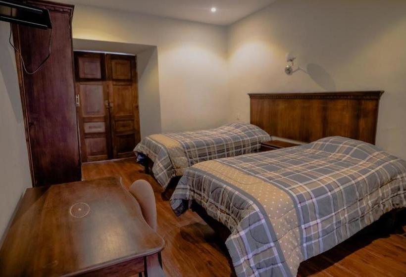 Suites & Hotel El Quijote