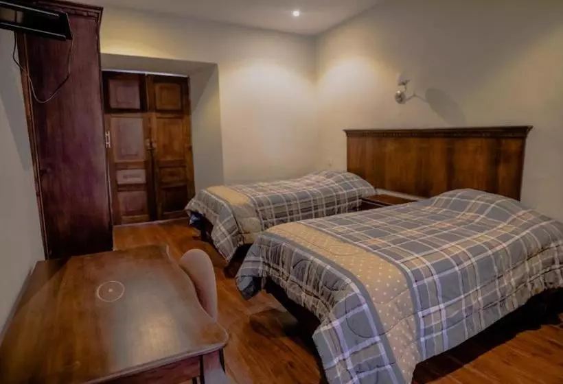 Suites & Hotel El Quijote