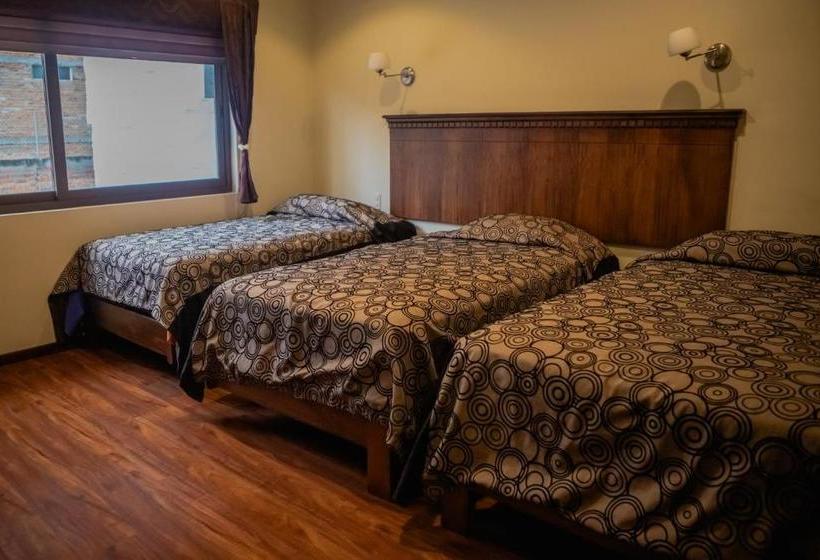 Suites & Hotel El Quijote